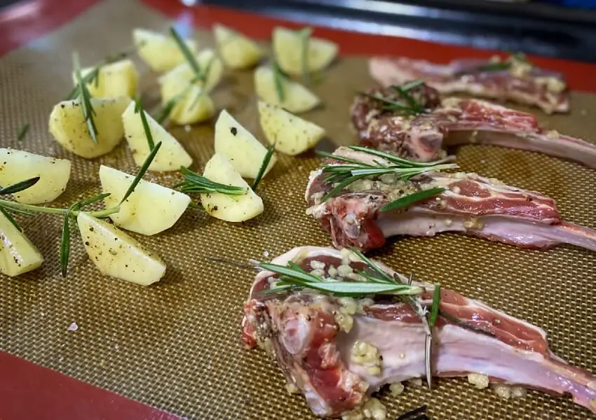 baked lamb chops with roast potatoes ready to bake